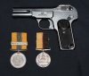 Pistol and Medals 1.JPG